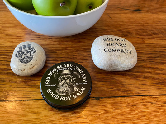 A tin of Cowboy Crush Good Boy Beard Balm by Big Dog Beard Company, featuring a rugged yet refined design inspired by the spirit of the Old West.