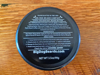 A tin of Cuppa Joe GOOD BOY Beard Butter by Big Dog Beard Company, closeup on table, Label