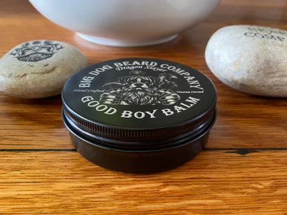 Handcrafted Dragon Slayer Good Boy Beard Balm by Big Dog Beard Company, presented in a ruggedly elegant tin with scents of orange, grape, clove, rose and Patchouli.