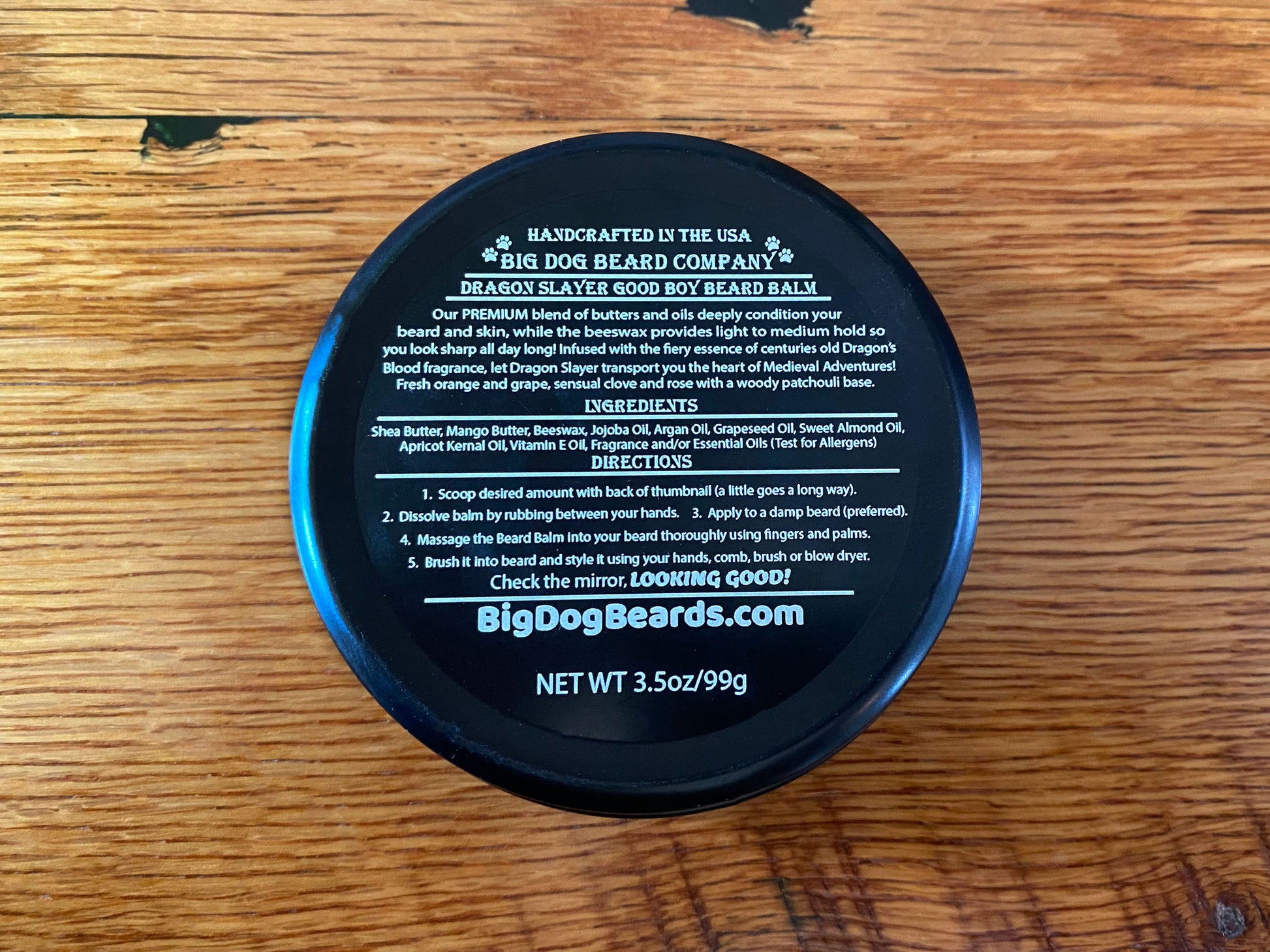 A tin of Dragon Slayer Good Boy Beard Balm by Big Dog Beard Company, featuring a rugged yet refined design inspired by Medieval Knights of Old! Label View