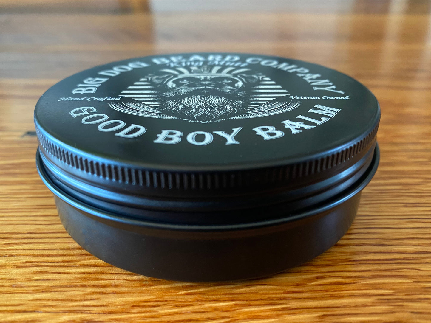 Handcrafted King Mutt Good Boy Beard Balm by Big Dog Beard Company, presented in a ruggedly elegant tin with scents of frankincense, myrrh, sandalwood and amber. Side View