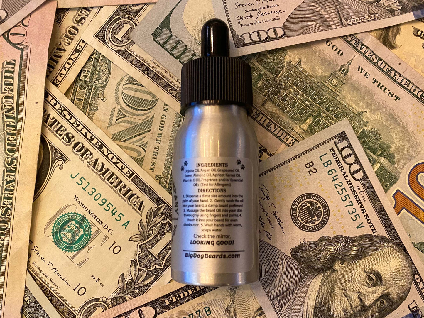 Money Bags Good Boy Beard Oil by Big Dog Beard Company, presented in an elegant bottle with scents of cedarwood, leather and mint.