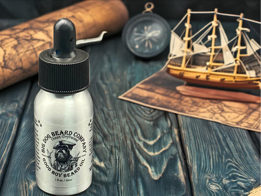 A bottle of Ocean Driftwood Good Boy Beard Oil by Big Dog Beard Company, featuring a rugged yet refined design inspired by the spirit of the Sea.