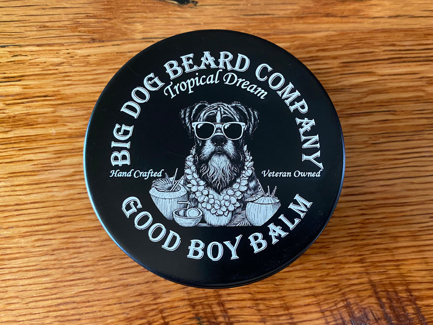 A tin of Tropical Dream Good Boy Beard Balm by Big Dog Beard Company. Top View