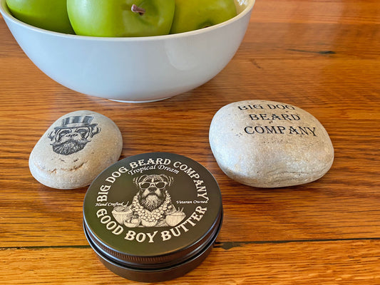 A tin of Tropical Dream Good Boy Beard Butter by Big Dog Beard Company, featuring an elegant design that embodies the spirit of a resort vacation.