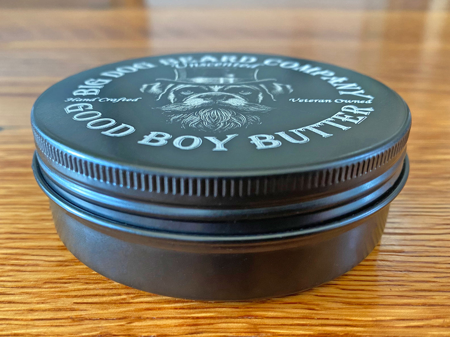 A tin of Big Dog Beard Company Unscented GOOD BOY Beard Butter side view.